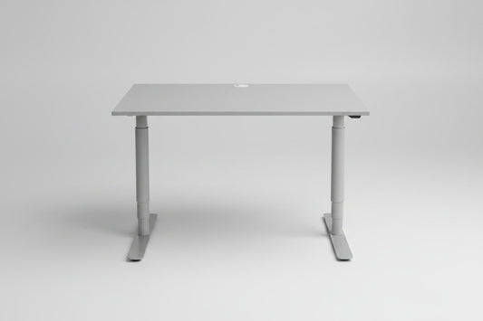 Frontvisning af Denconi hæve-sænkebord 120x80 cm med lysegrå laminatbordplade og robust T-stel.