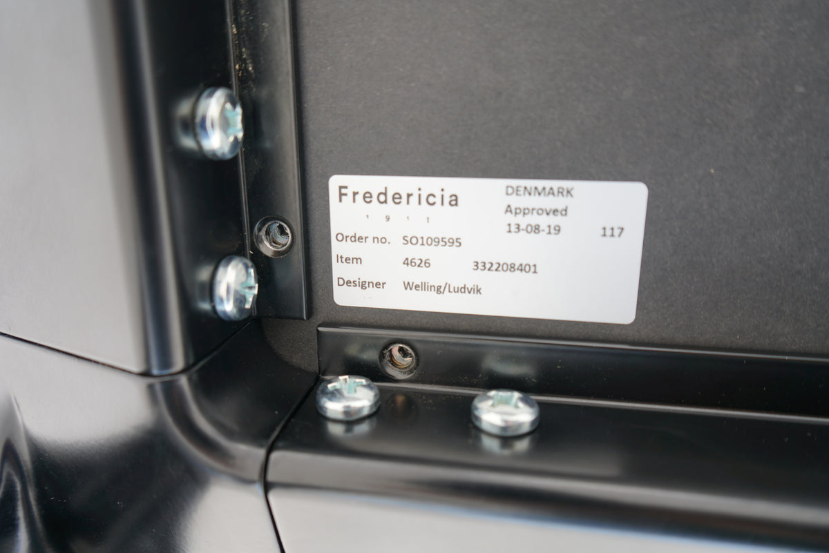 Fredericia producentlogo på Welling/Ludvik møde- og konferencebord.