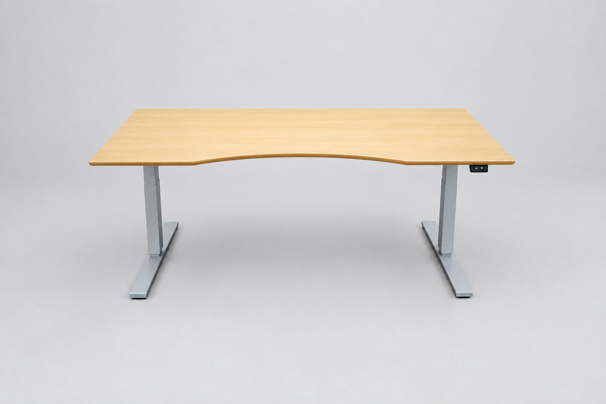 Dencon ergonomisk hæve-sænkebord 180x90 cm med mavebue og gråt LINAK stel – set forfra