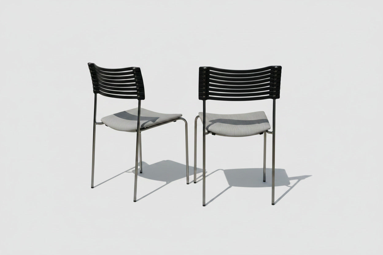 Duba B8 stabelbare konferencestole med sort ryg og kromstel samlet set bagfra