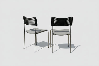 Duba B8 stabelbare konferencestole med sort ryg og kromstel samlet set bagfra