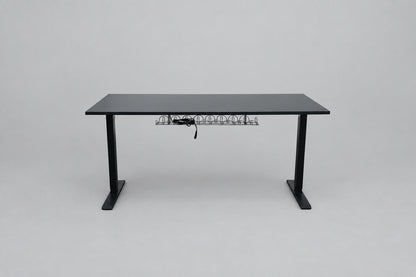 IKEA hæve-sænkebord 160x80 cm med sort stel og praktisk kabelbakke – set bagfra