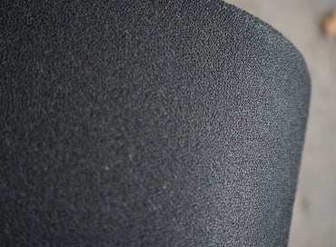 Close-up af Interstuhl kontorstolens fuldpolstrede sæde og ergonomiske detaljer